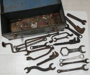 lot 33 image: Tool box with a bunch of old wrenches, Many stamped FORD, used on the Model Ts