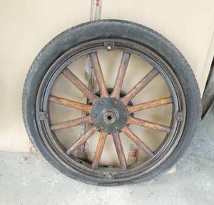 lot 35 image: Vintage Model T wheel with tire