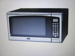 Oster 1.1 Cu. Ft. 1000-Watt Counter...