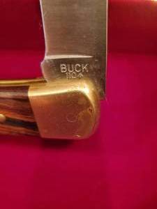 lot 2 image: Buck Knife # 110 in a Terry Redlin Commemorative Art Box