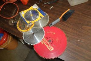 lot 438 image: Saw Blades, Shop Trouble Light, Small Hand Broom, Bungee Cord