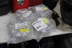 lot 460 image: Ford Hub Caps (in original packaging)
