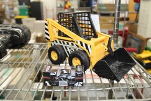 lot 518 image: Lot of (2) Toys  - Action #1 Earnhardt Ganassi Felix Sabates Die-cast Car, Large Scale Hard Hat Bobcat