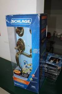 lot 577 image: Schlage Solid Forged Brass Front Entry Set (in original packaging)