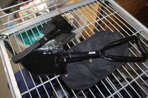 lot 604 image: SOG Camping Shovel with Carry Bag, Hand Axe with Leather Cover