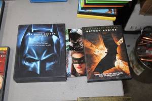 lot 617 image: Blu-ray Disc Dark Knight Trilogy, DVD Batman Begins