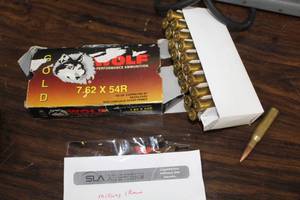 lot 306 image: Lot of ( 1 box ) Wolf Gold 7.62x54R 150 Grain Full Metal Jacket Cartridges ( 19 per box )