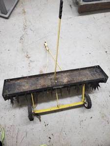 lot 27 image: pull behind lawn aerator