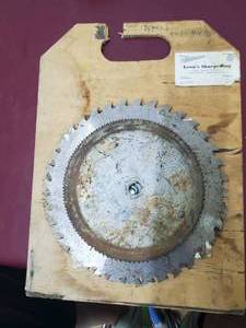 lot 33 image: Saw Blade holder with Misc. Blades as Shown