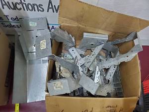 lot 51 image: Box of assorted building materials including joist hangers