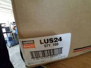 lot 85 image: sealed box of 100 Simpson Strong-Tie Lus24 Joist Hangers