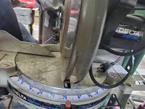 lot 28A image: delta shopmaster miter saw