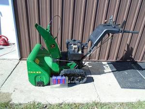 John Deere tracked snow blower. Runs. As shown.