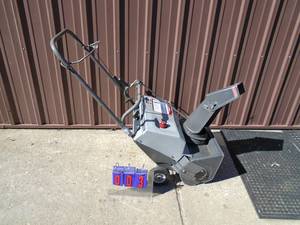Used snow thrower. Runs. As shown.