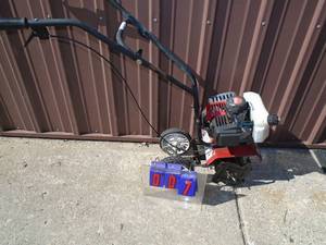 Earth quake mini tiller. Used condition. Works. As shown.