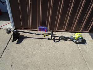 Ryobi 4 stroke weed trimmer. Works. As shown.