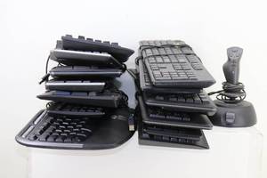 lot 56 image: Misc Keyboards & Joystick