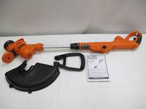 lot 376 image: Black  Decker 14 in. 6.5-Amp Corded Electric Straight Shaft Single Line 2-in-1 String Grass TrimmerLawn Edger