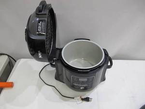 lot 387 image: Ninja OP302 11-In-1 5.5 Quart Slow Cooker Air Fryer Pressure Cooker