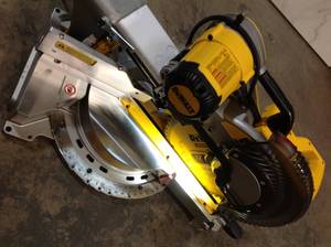 lot 4 image: 15 Amp Corded 12 in. Double Bevel Sliding Compound Miter Saw with XPS technology, Blade Wrench & Material Clamp by DEWALT