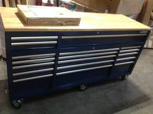 lot 14 image: 72 in. 18-Drawer Mobile Workbench with Solid Wood Top in Gloss Blue by Husky