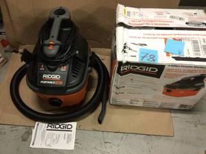 4 Gal. 5.0-Peak HP Portable WetDry Shop Vacuum with Filter, Dust Bag, Locking Hose and Car Nozzle by RIDGID Customer Returns See Pictures
