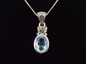 .925 Sterling Silver Oval Cut Topaz Pendant Necklace