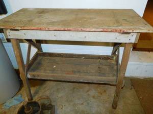 A Vintage Table W A Shelf Near The Bottom On Four Legs