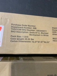 lot 1 image: Home Decorators Collection Fremont 72 in. Marbled Backsplash in Grey & Sadie 67 in. Marbled Backsplash in White. Various Conditions. See Pictures