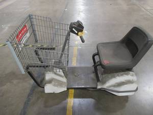 lot 443 image: MART CART ELECTRIC SHOPPING CART, Does not run. For parts or restore.