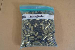 lot 93 image: Bag of .357 Sig Empty Casings