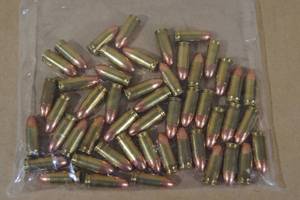 lot 100 image: 50 Loose Remington 9mm Luger FMJ Ammo