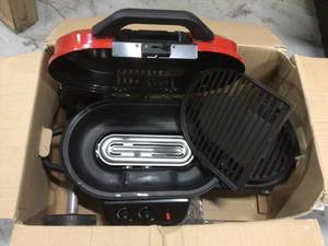 lot 22 image: Coleman  RoadTrip 225 Red SU Grill &nbspCustomer Returns See Pictures