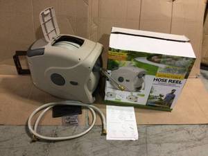 lot 85 image: Gartenkraft  100 ft. 58 in. Retractable Garden Hose Reel XW Series Spray Nozzle Not Included &nbspCustomer Returns See Pictures
