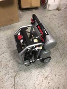 lot 102 image: 4.5 Gal. Portable Electric-Powered Silent Air Compressor by Husky Customer Returns See Pictures