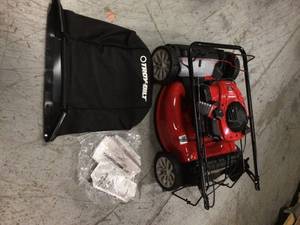 lot 105 image: 21 in. 140cc 550e Series Briggs & Stratton Engine 2-in-1 Gas FWD Self Propelled Lawn Mower by Troy-Bilt Customer Returns See Pictures