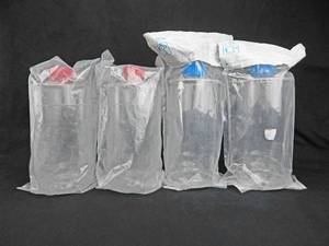 lot 111 image: Set of 4 Tissue Culture Bottles