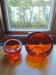 lot 160 image: Two Orange Glass Ashtrays