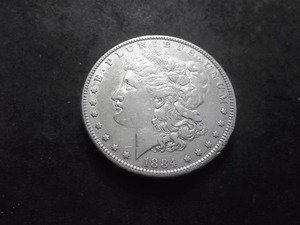 lot 12 image: 1884 Morgan Silver Dollar