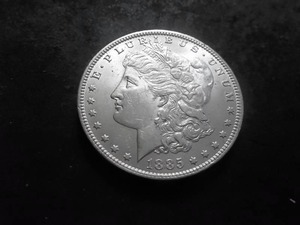 lot 14 image: 1885 O Morgan Silver Dollar