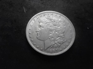 lot 24 image: 1891 O Morgan Silver Dollar