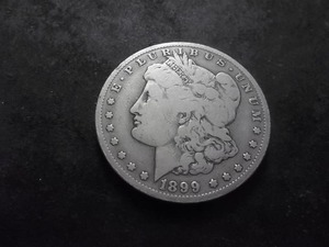 lot 35 image: 1899 O Morgan Silver Dollar