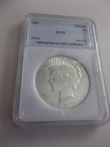 lot 70 image: 1927 Peace Silver Dollar