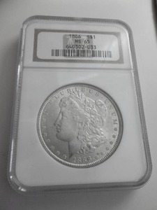 lot 49 image: 1886 Morgan Silver Dollar