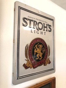 lot 97 image: Embossed Metal STROHS Light Beer Sign