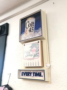lot 126 image: Vintage COLT 45 Malt Liquor Beer Calendar Sign
