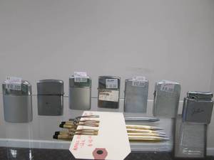 lot 33 image: Lot of Assorted Lighters & Pens