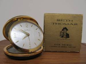 lot 47 image: Nice Vintage Passport by Seth Thomas Leather Clad Travel Alarm Clock