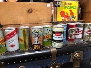 lot 141 image: All Items on Top of Old Trunk - Records Comic Books Beer Cans etc