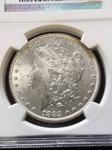 1883-O MORGAN SILVER DOLLAR MS62 NGC